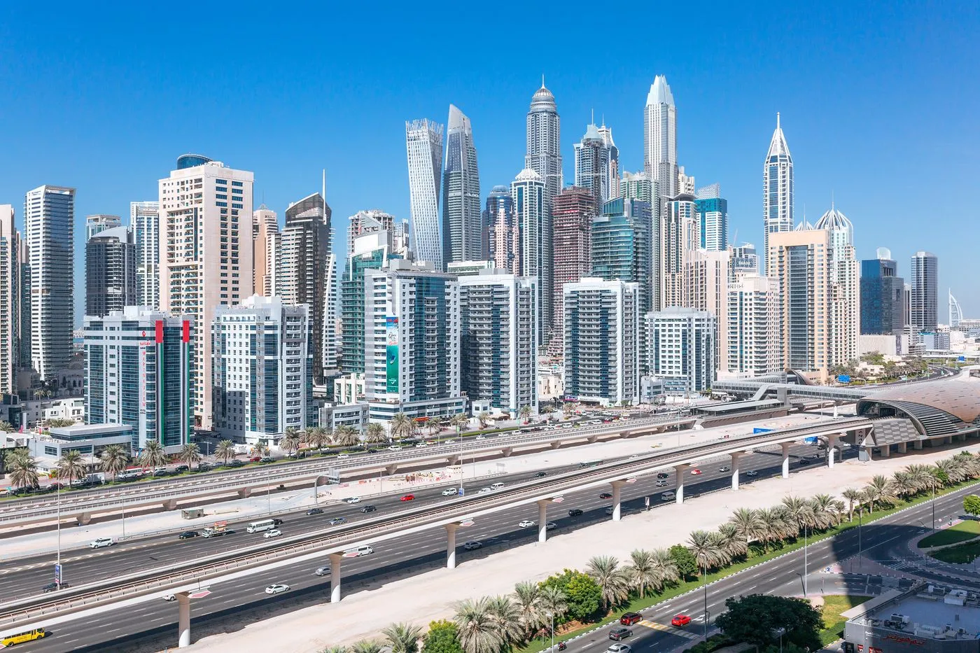Dense cluster of skyscrapers at Dubai Marina beside Sheikh Zayed Road